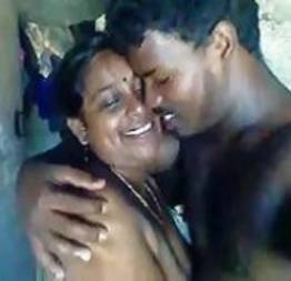 Indian Aunty with young man at home