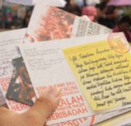 Por meio de cartões postais, cristãos protestam na Indonésia