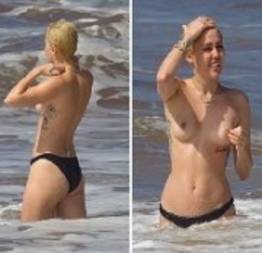 Miley Cyrus faz topless na praia do Havaí.