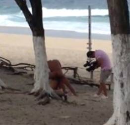 Flagra de filme porno sendo gravado na praia