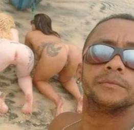 Pescador malandro fodendo mulher albina e morena rabuda na areia da praia