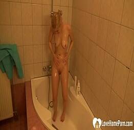 Hottie gets recorded by a camera while showering